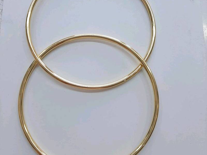 Asas bolso metal dorada